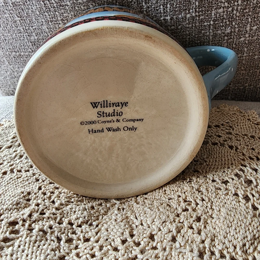 Williraye Studio cup with tiger/cat, star and angel